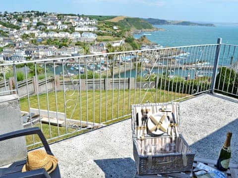 Wonderful patio area with spectacular coastal views | Berlewen - Polhaun Holiday Apartments, Mevagissey, near St Austell