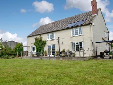 Delightful holiday home with large lawned garden | Moor Farm, Reighton Gap near Filey