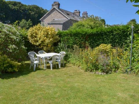 Lovely lush garden with sunny sitting out area | The Old Post Office, Grange-over-Sands