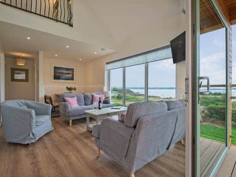 Living area with wonderful sea views | Curlew Cottage, Mossyard, near Gatehouse of Fleet