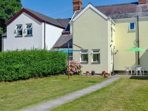 Large lawned rear garden with patio area | Hazeldene - Murton Farm, Murton, near Swansea