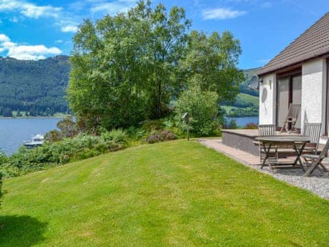 Loch views from the delightful garden | Seaside Cottage - Mullardoch Cottages, by Inverinate, Kyle