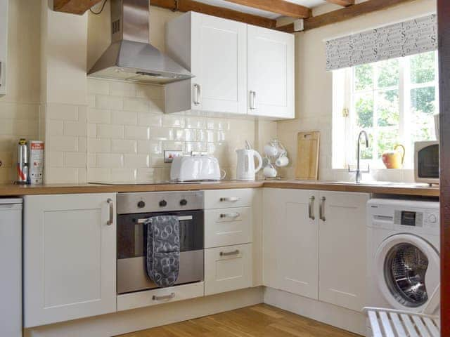 Well-equipped fitted kitchen. | Repton Cottage - Foremark Cottages, Milton, near Repton