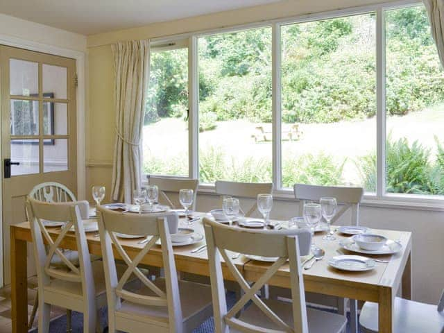 Garden/dining room with garden view | Broomriggs Cottage, Near Sawrey, Hawkshead