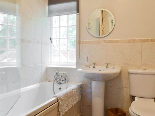 Family bathroom with shower over bath | Broomriggs Cottage, Near Sawrey, Hawkshead