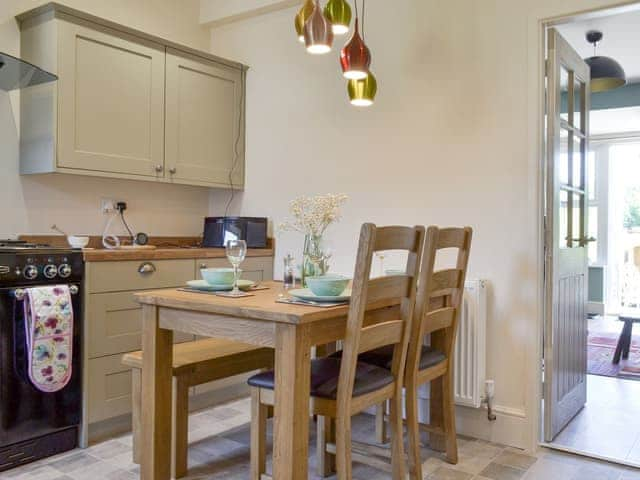 Convenient dining area within kitchen | Running Hare, Windermere