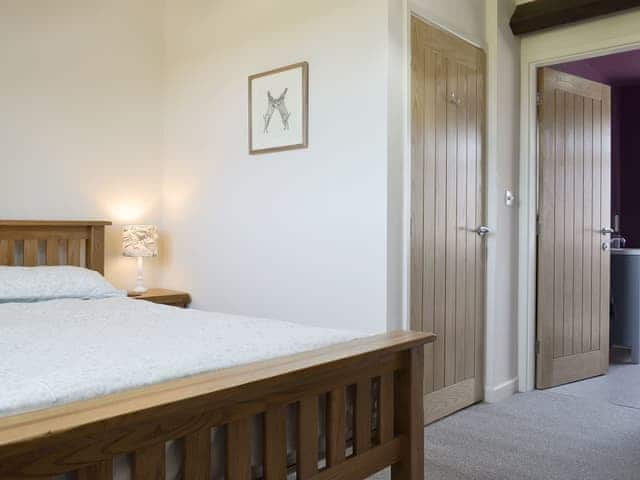 Spacious en-suite master bedroom | Running Hare, Windermere