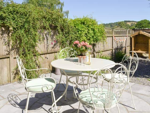 Courtyard garden with patio area | Running Hare, Windermere