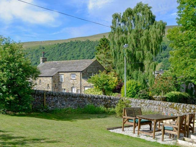 Lawned garden with wonderful views of the surrounding area | Wellside Cottage, Starbotton, near Kettlewell