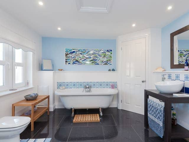 Family bathroom with free-standing bath and separate shower cubicle | Moonbeam House, Freshwater Bay