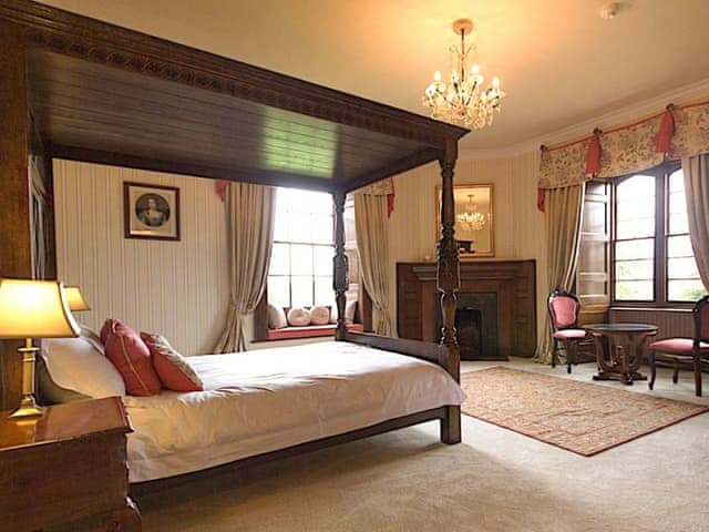 Inviting four poster bedroom | Hockwold Hall, Hockwold, near Thetford