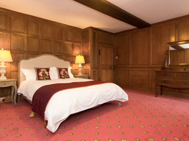 Wood panelled double bedroom | Hockwold Hall, Hockwold, near Thetford