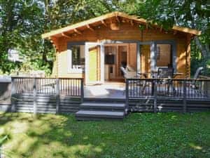 Comfortable and cosy modern, detached lodge in a peaceful woodland setting | Trelispen Lodge, Perran Downs, near Marazion