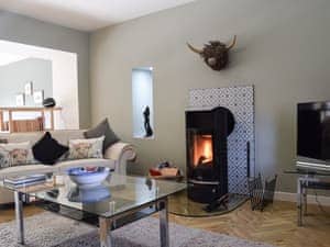 Lounge area with wood burner | Briar Cottage, Gargunnock, near Stirling