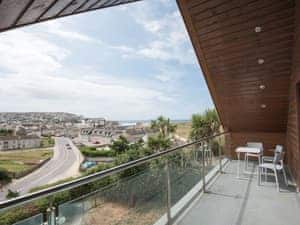 View from balcony over village and to the sea | Lyndhurst, Perranporth