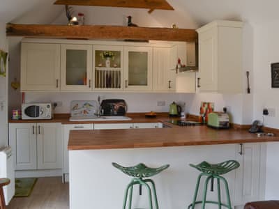 Kitchen with breakfast bar | The Olde Barn, Welton, near Lincoln