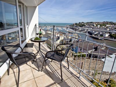 The gorgeous sunny balcony offers an ideal place for alfresco dining | Dual View - Linden Court, Brixham