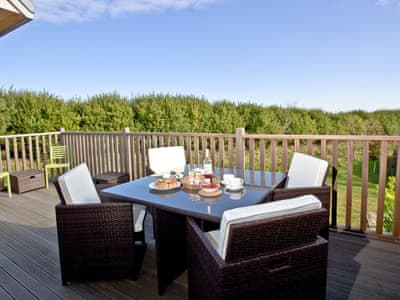 Sitting-out-area | Una Aurum 56 - St Ives Resort, Carbis Bay, near St Ives