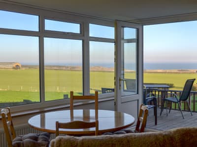 Wonderful sea views from the dining area | Brackenrigg, Embleton near Craster