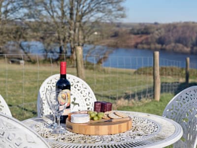 Relaxing sitting-out-area | The Barn by The Lake, Brompton Regis, near Dulverton