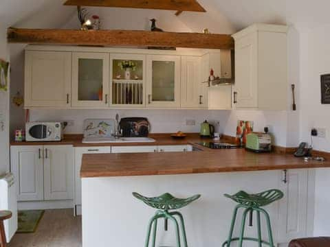 Kitchen with breakfast bar | The Olde Barn, Welton, near Lincoln