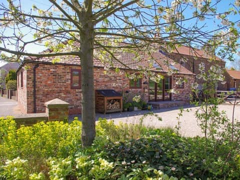 Attractive holiday home | The Old Forge, West Lutton near Malton