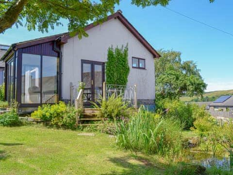 Delightful studio accommodation (unfenced pond in the garden) | Borran Annexe, Oxen Park, near Ulverston