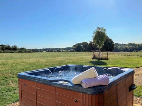 Relaxing hot tub | The Stalls - The Hayloft & The Stalls, Aynho, near Banbury