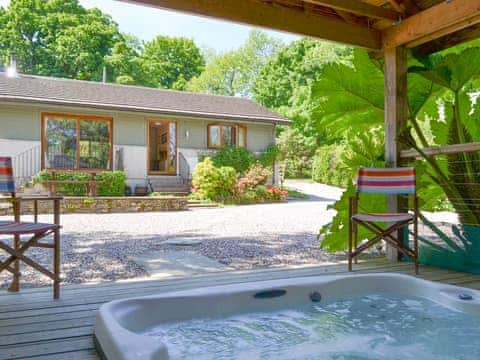 Fabulous sunken hot tub overlooking the charming holiday home | Tigh A Vullin, Ardfern, near Lochgilphead