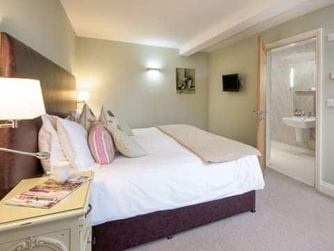 Welcoming double bedroom with super kingsize bed | Ash Cottage, Castle Carrock, near Brampton