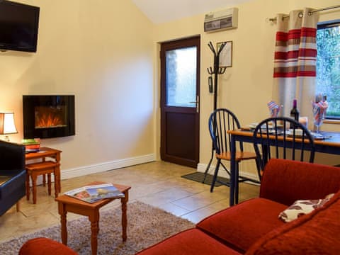 Cosy open plan living space | Ty Bach Twt - Penrhiw Cottages, Llangeitho, near Tregaron