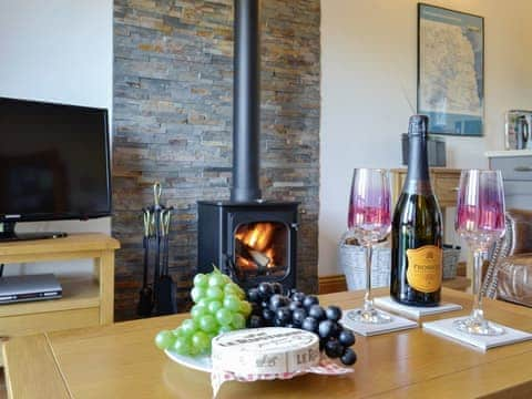 Inviting living area with wood burner | Stanegate Cottage - Braeside Cottages, Greenhead, near Haltwhistle