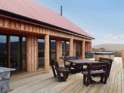 Extensive decked area with seating | Osprey Lodge, Rogart, near Dornoch