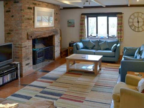 Spacious living room with wood burner | Reuben&rsquo;s, Boreston, near Totnes