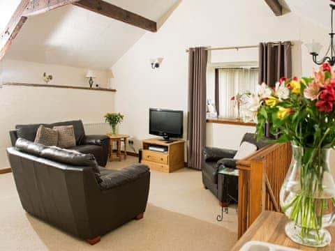 Stylishly furnished living room | Curlew Cottage, Newbiggin, near Penrith 