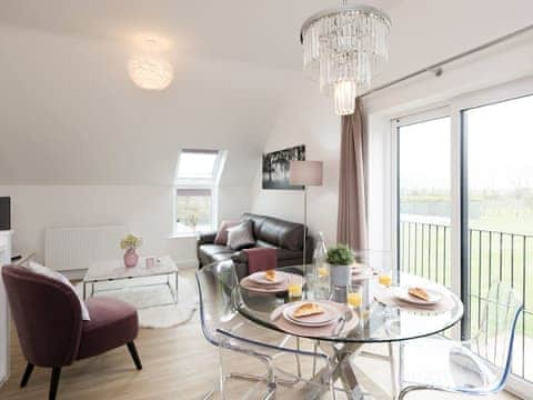 Dining area with wonderful far reaching views | The Fox - High Oak Holidays, Wicklewood, near Wymondham