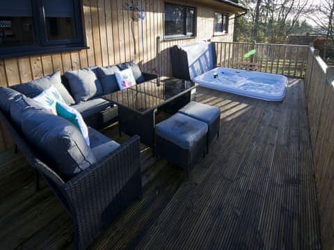 Lovely decked area in which to sit back and unwind | The Hideaway, Otterburn, near Bellingham