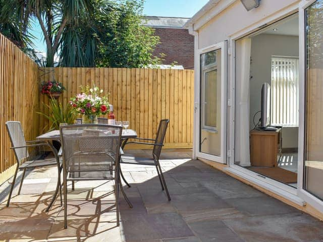 Patio with sitting out furniture | Albert Apartment, Poole