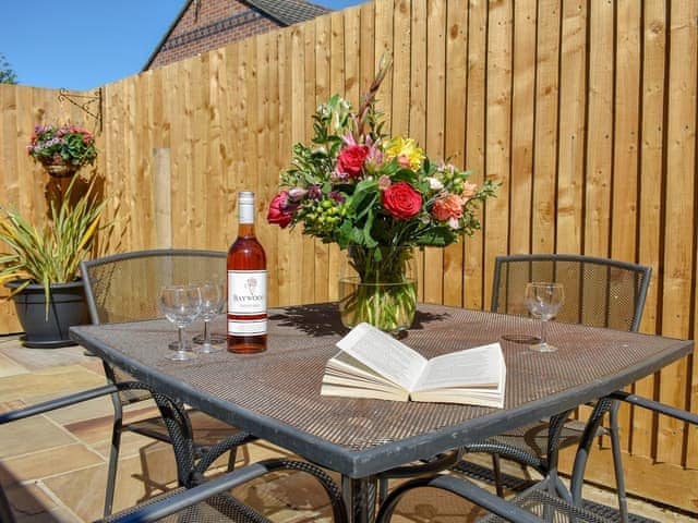 Patio with sitting out furniture | Albert Apartment, Poole