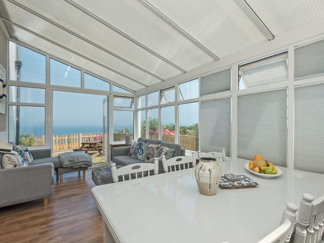 Impressive conservatory with French doors leading to garden | Marion&rsquo;s Sea View, Overstrand, Cromer