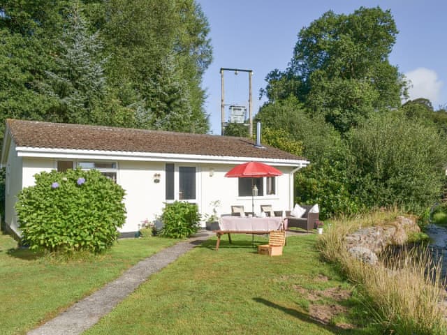 Detached lodge is in an attractive setting beside a babbling brook | Westville by the Stream, Rosecraddoc, near Liskeard