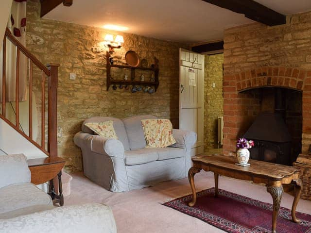 Cosy living room with wood burner | Picket Piece Cottage, Chadlington, near Chipping Norton