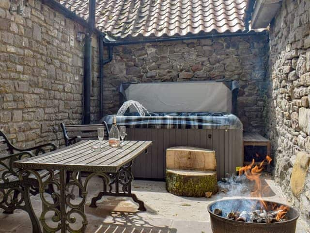 Excellent patio area with relaxing hot tub | Tavern Cottage - Tavern Cottages, Newsham, near Richmond