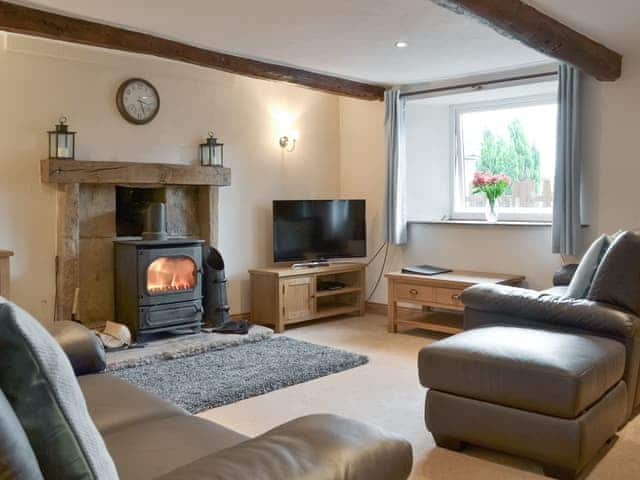 Spacious living room with exposed beams | Townend Cottage, Soulby, near Kirkby Stephen