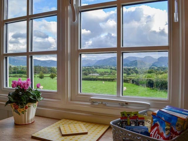 Modest dining area with beautiful surroundings | Skiddaw - Lake View Shepherds Huts, Millbeck, near Keswick