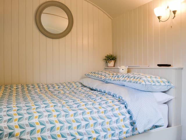 Comfortable and inviting double bed | Skiddaw - Lake View Shepherds Huts, Millbeck, near Keswick