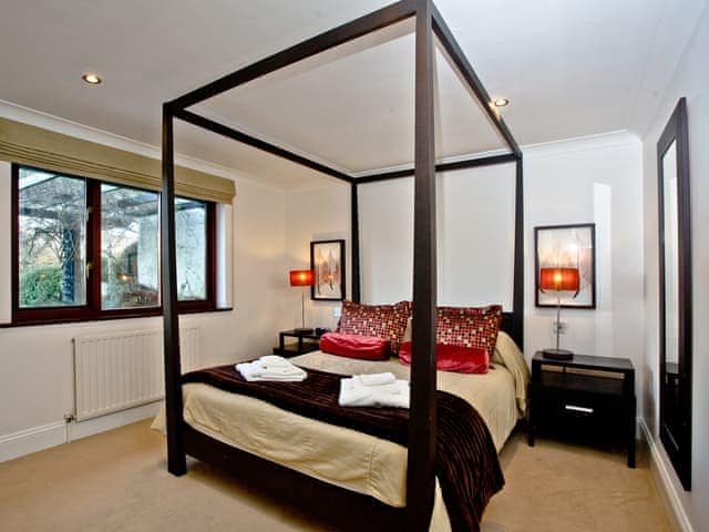 Stunning four poster bedroom | Honeysuckle - Woodland Retreat, Wadebridge