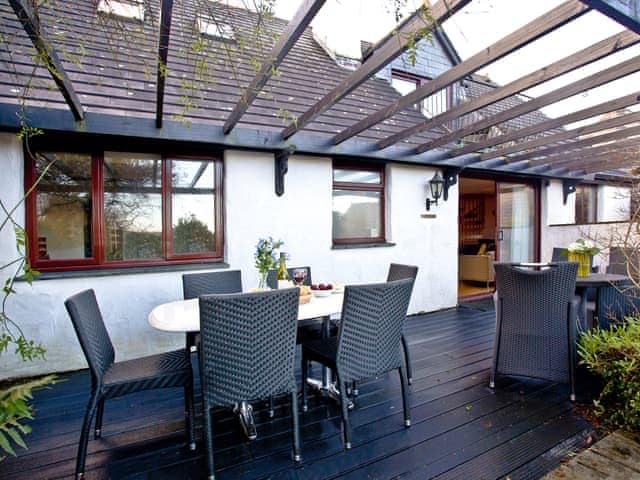 Decked area with patio furniture | Honeysuckle - Woodland Retreat, Wadebridge