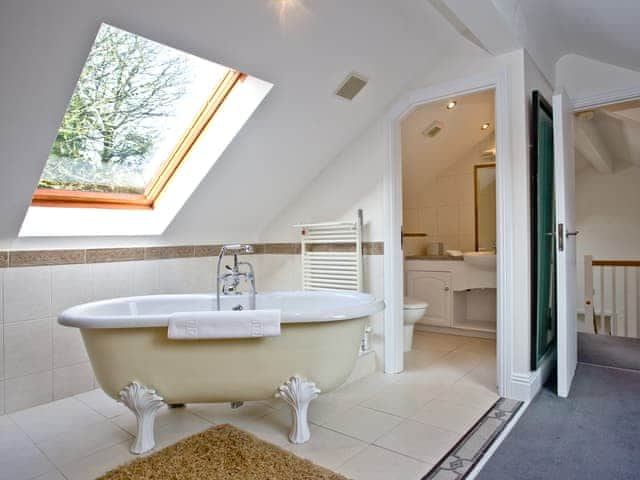 Standalone roll top bath in the double bedroom | Rose - Woodland Retreat, Wadebridge