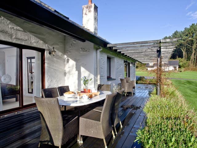 Decked terrace with garden views | Rose - Woodland Retreat, Wadebridge